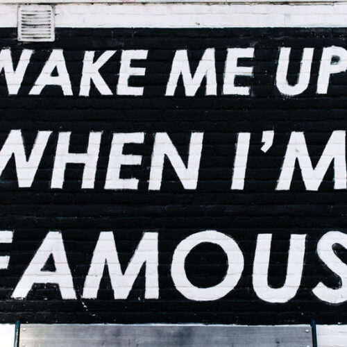 a sign outside that says wake me up when I'm famous