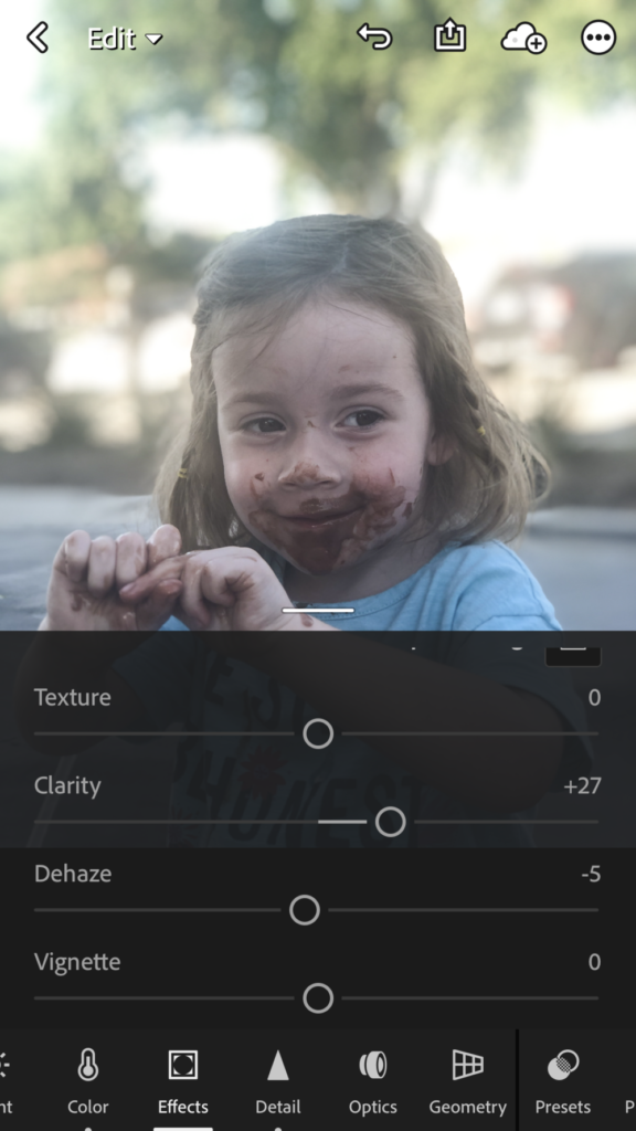 Little girl with chocolate ice cream on her face edited in Adobe Lightroom