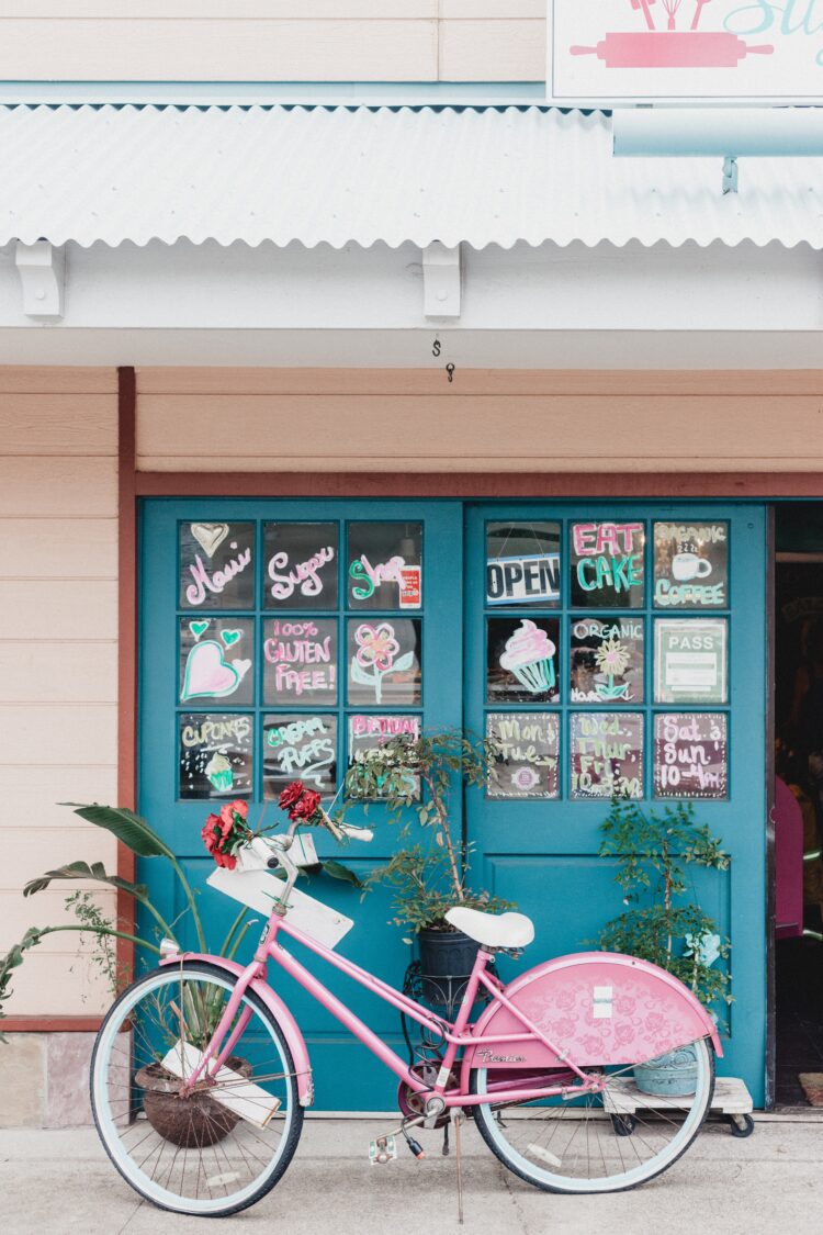 pink bicycle near house